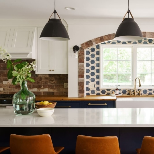 remodeled kitchen with navy and warm tones
