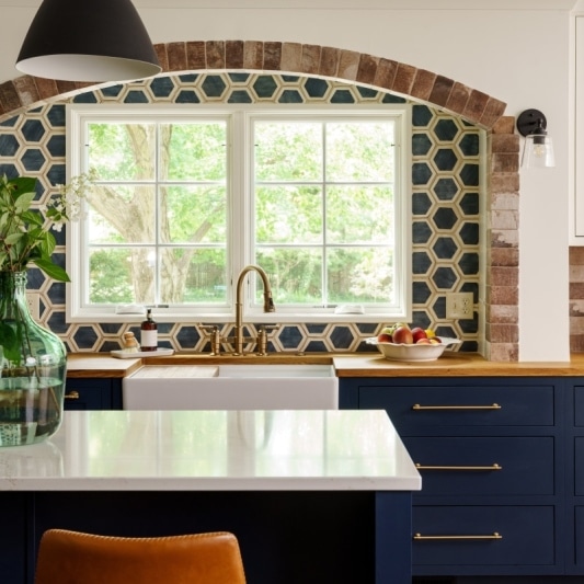 freshly remodeled kitchen with blue and warm bright accents