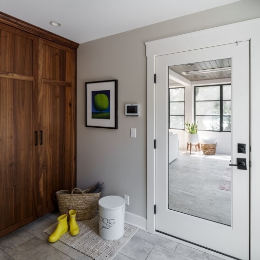 mudroom hallway between main house and covered porch addition