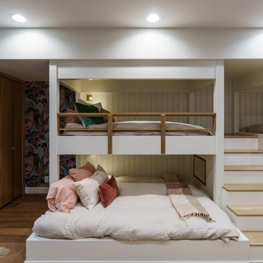 Luxury basement remodel with girls bunk room