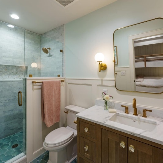 Luxury basement remodel with girls bunk room bathroom