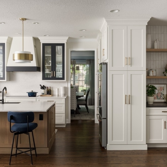 modern sleek glam main floor remodel with black and white details and gold accents and white oak island