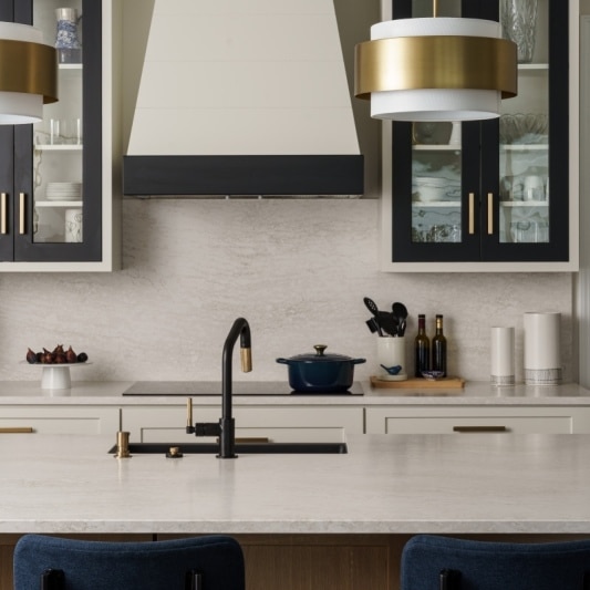 modern sleek glam main floor remodel with black and white details and gold accents and white oak island