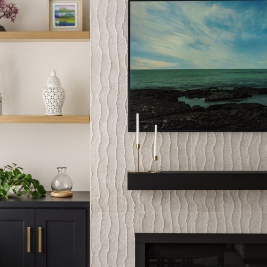 modern sleek fireplace with built ins in black and white main floor remodel