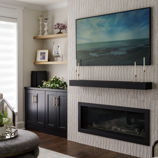 modern sleek fireplace with built ins in black and white main floor remodel