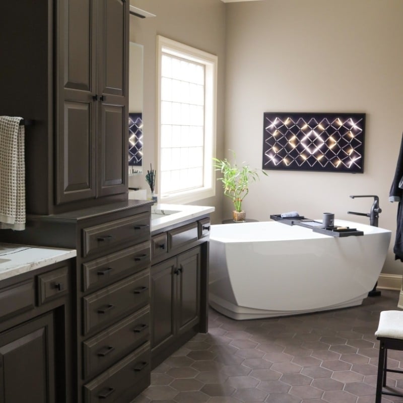 spa like primary bath remodel with large soaking tub near window