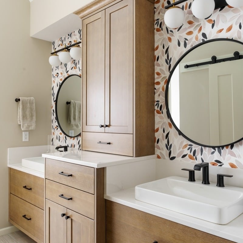 modern sleek primary bath with floral leaf wallpaper. spa like calming bright vibes