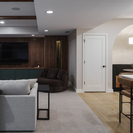 Basement with living area and built-in banquette with dome ceiling