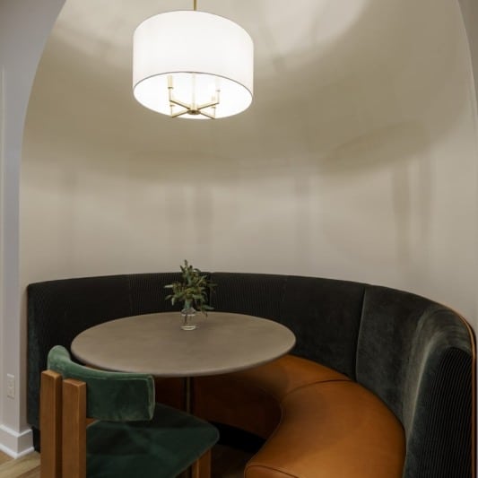 Close up of banquette table area with dome ceiling