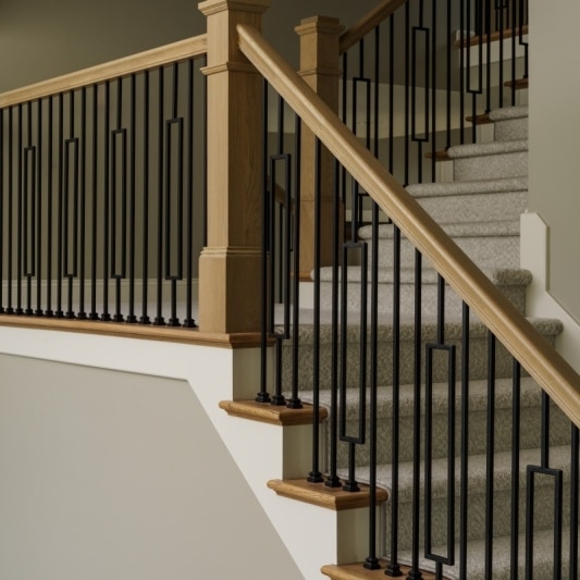 modern sleek railing and balusters in whole home remodel