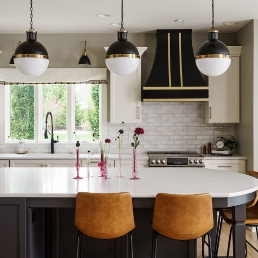 modern funky whole home remodel with classic white kitchen and art deco inspired butlers pantry