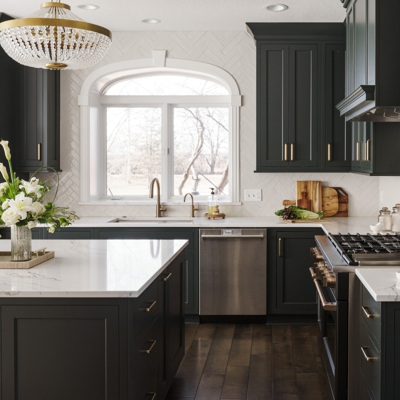 Glamorous kitchen with dark cabinets
