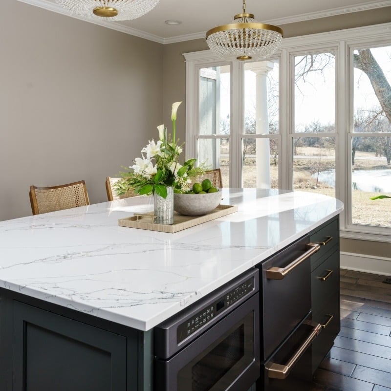 Glamorous kitchen with dark cabinets