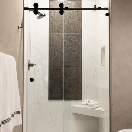 luxury-shower-with-textured-tile-accent