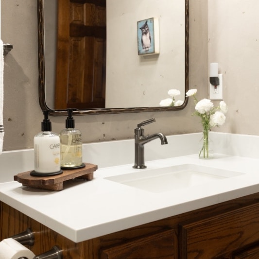 warm-wood-stained-cabinets-with-bright-white-counters