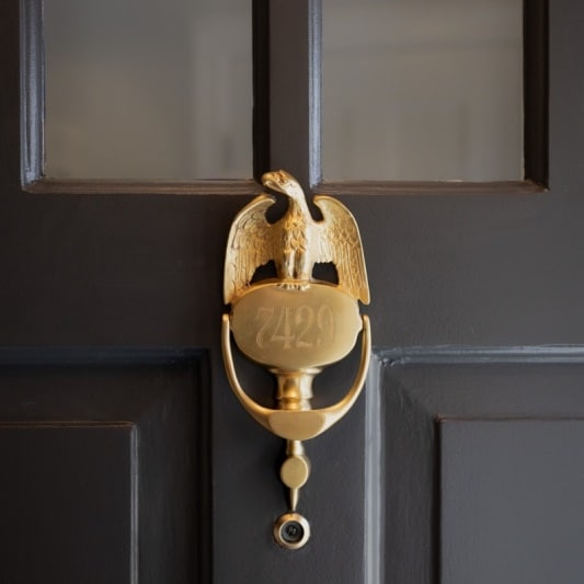 dutch door remodel with dark storm grey paint and brass hardware