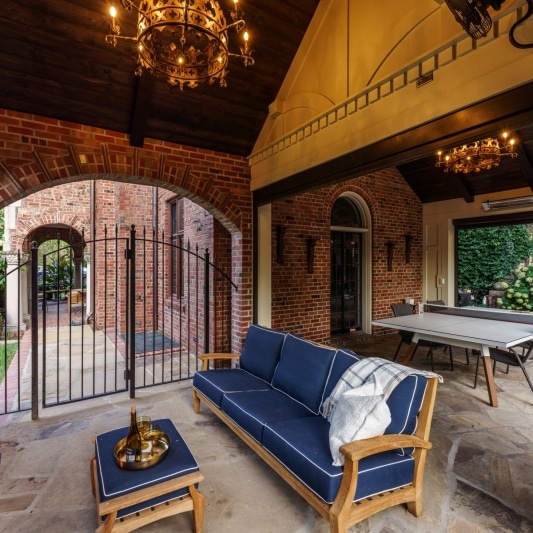 covered porch addition with traditional elements and italian inspiration