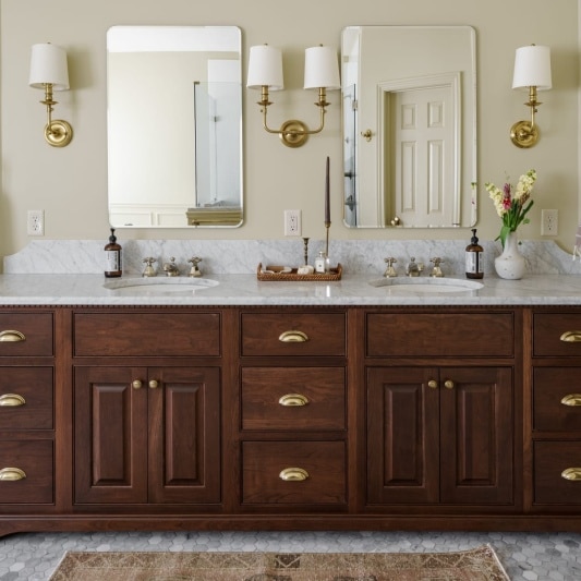 Classic charm dark stained oak vanity in primary bath remodel