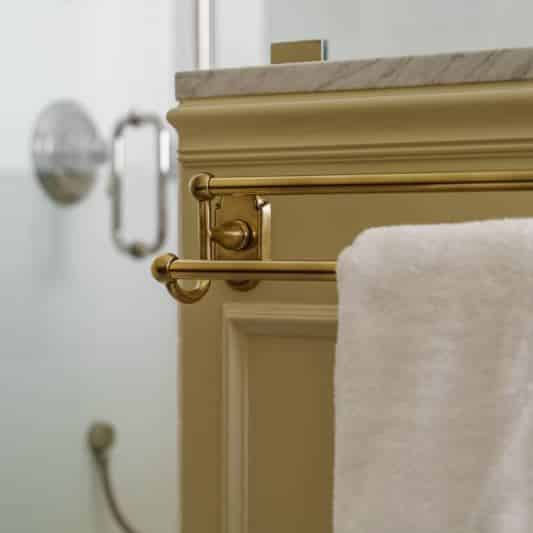 detail shot of brass towel bar
