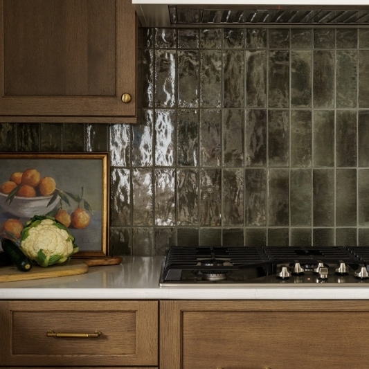 earth tone kitchen with warm wood oak and gold accents for moody modern design
