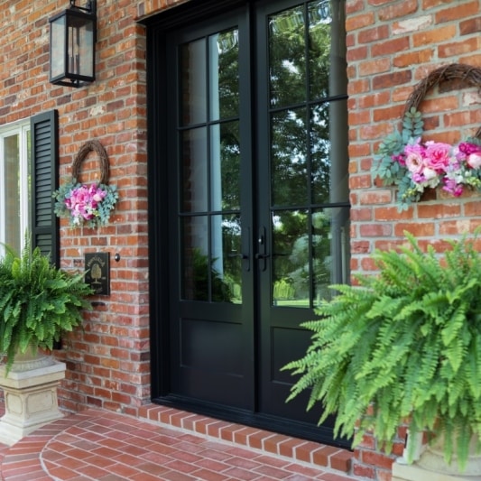 sleek modern update for a traditional home with new transom and french doors