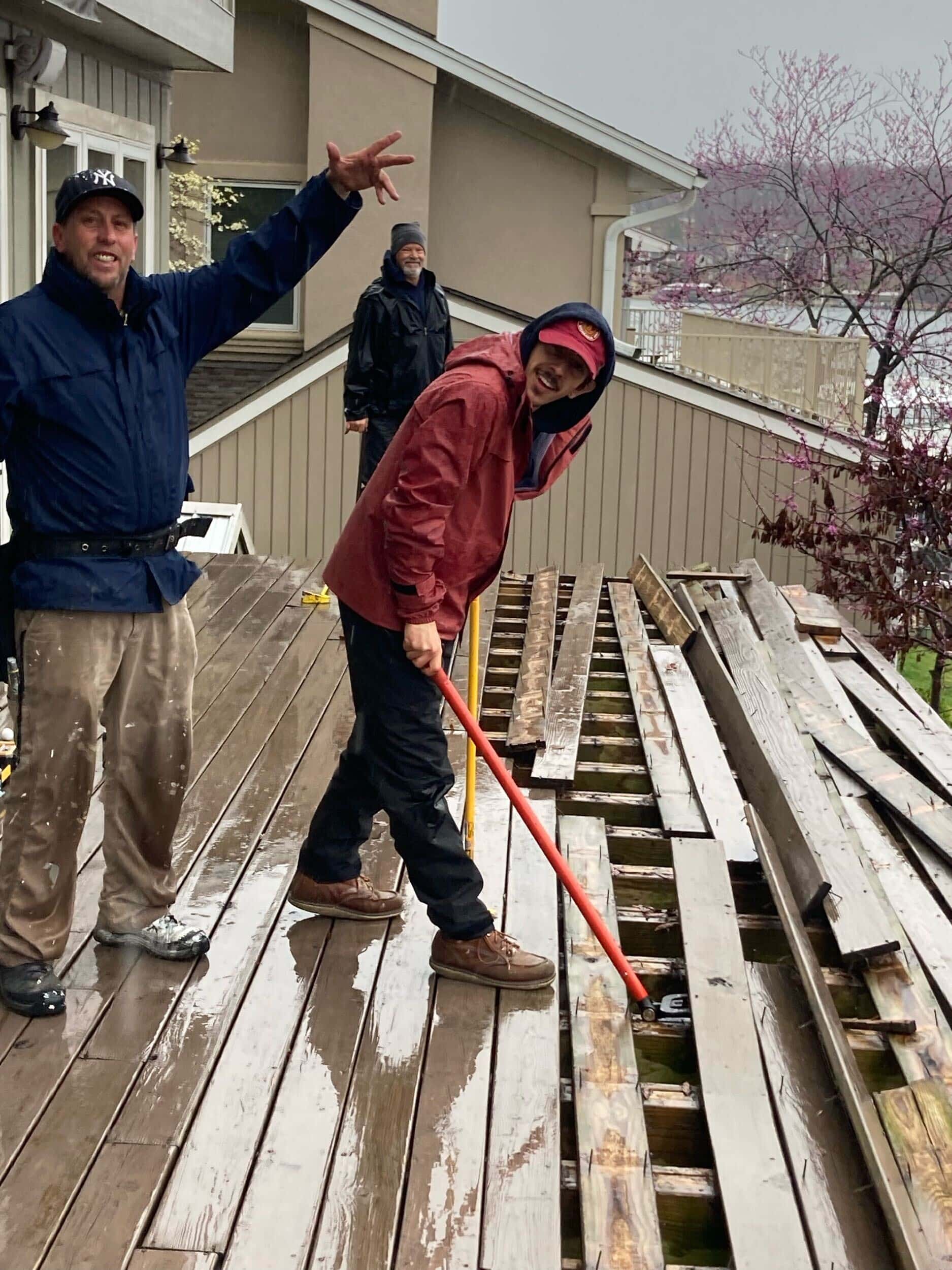 Handyman team working in rain at lake of the ozarks