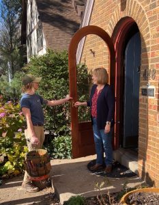 Technician greeting client