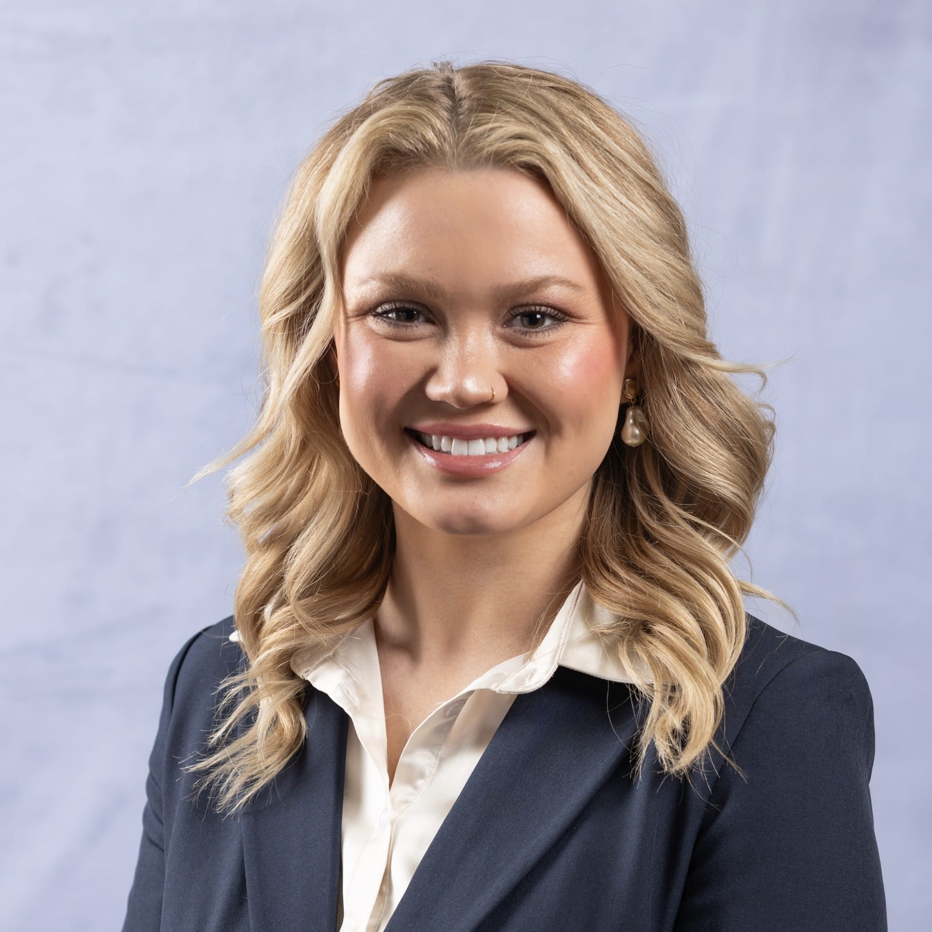 Lindi Peterson Headshot marketing associate and social media manager at Schlogel Design Remodel