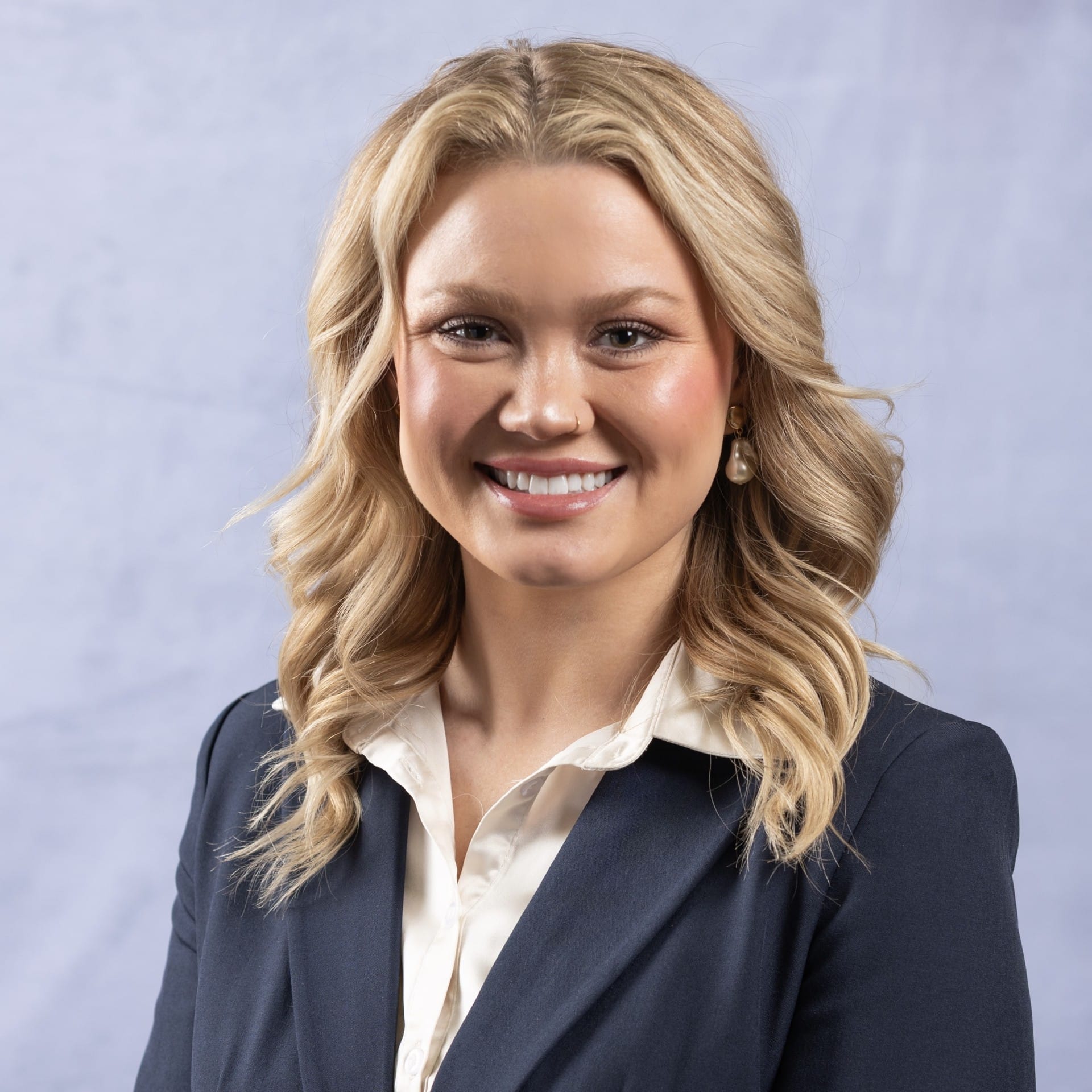 Lindi Peterson Headshot marketing associate and social media manager at Schlogel Design Remodel