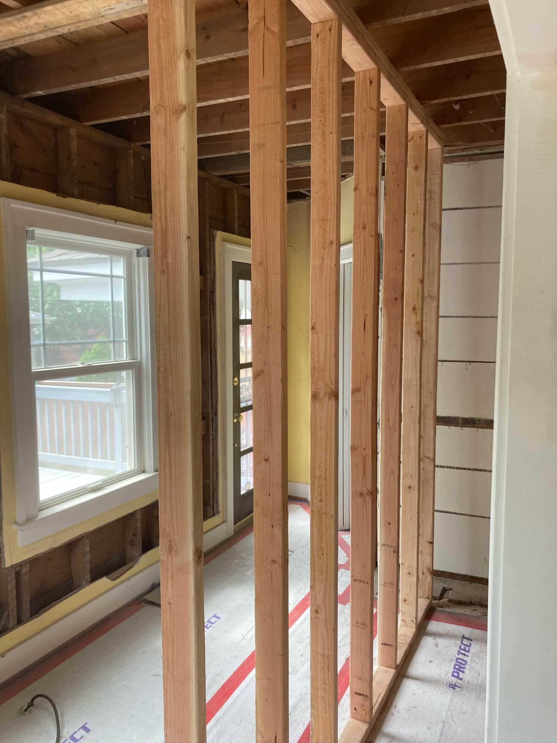 framing new long wall for cabinets