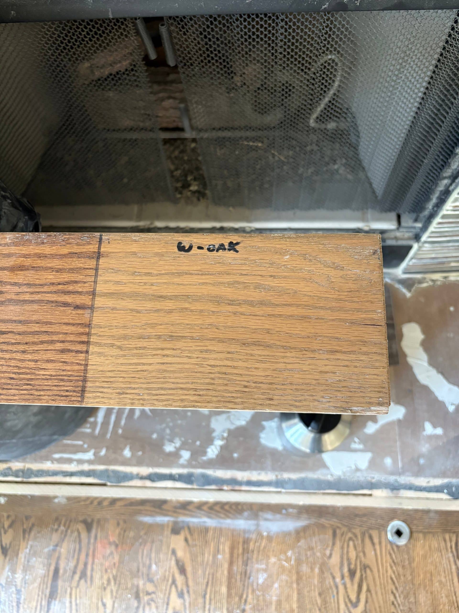 stain sample for the new floors. its a light warm neatural tone