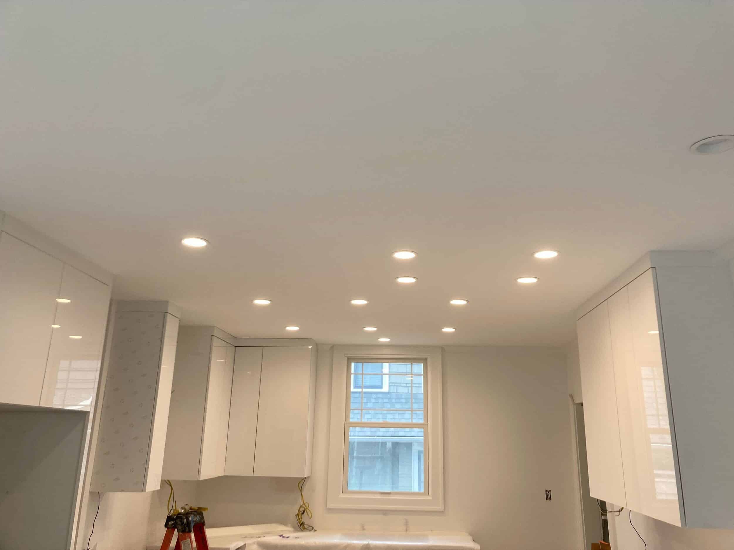 we removed the protective seal on the cabinets and now you can see the high glossy shine of the bright white sleek cabinets