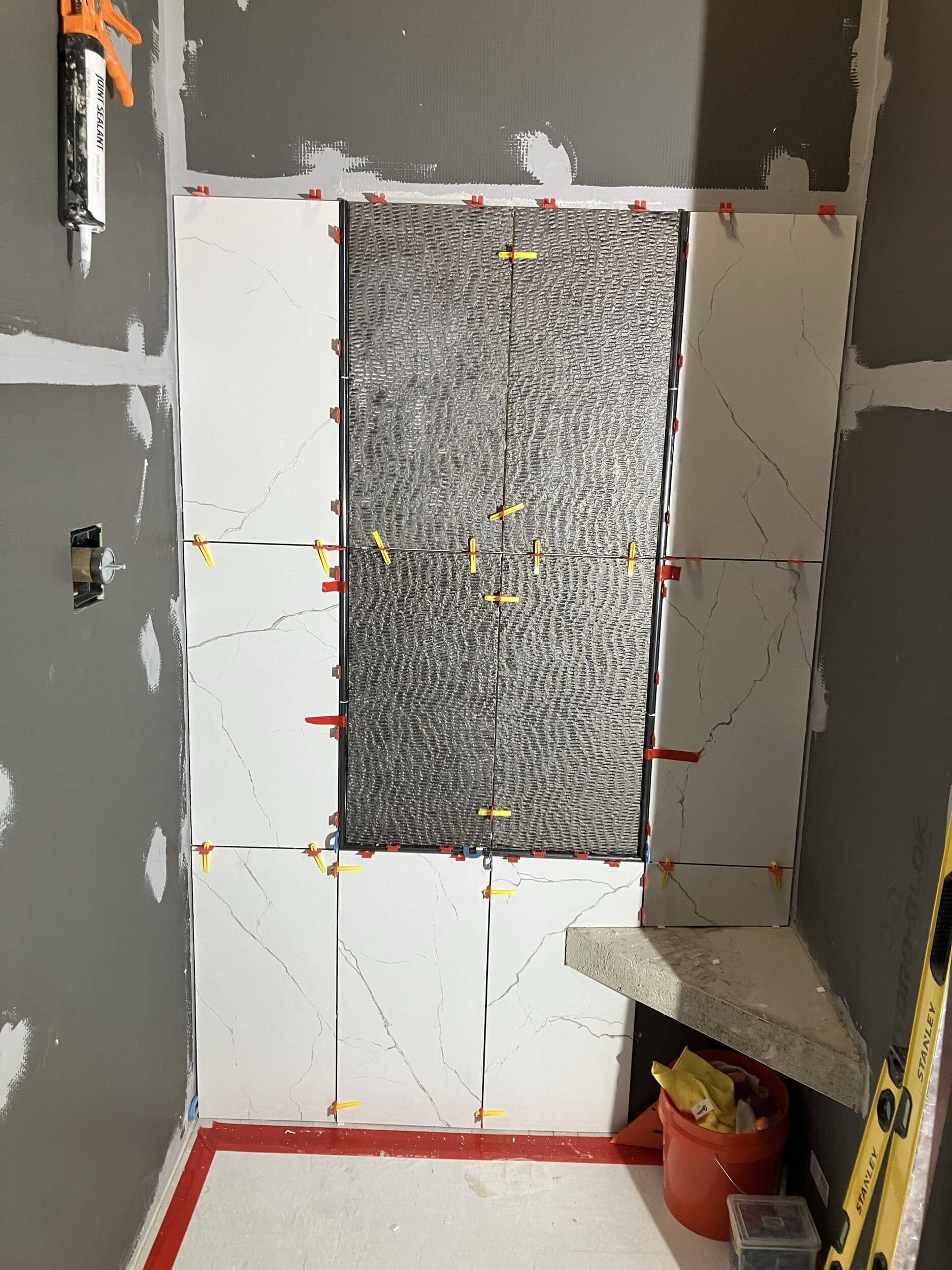 shower accent wall going up bottom half