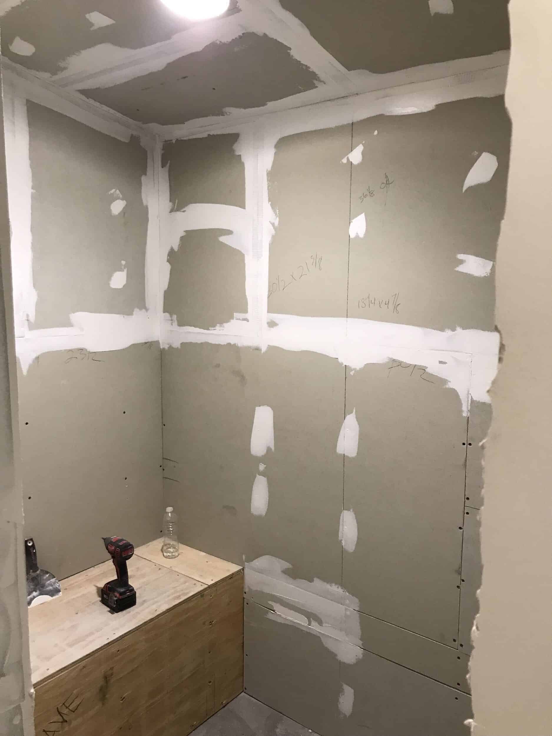 shower has been taped and glued and is drying. next will come tile