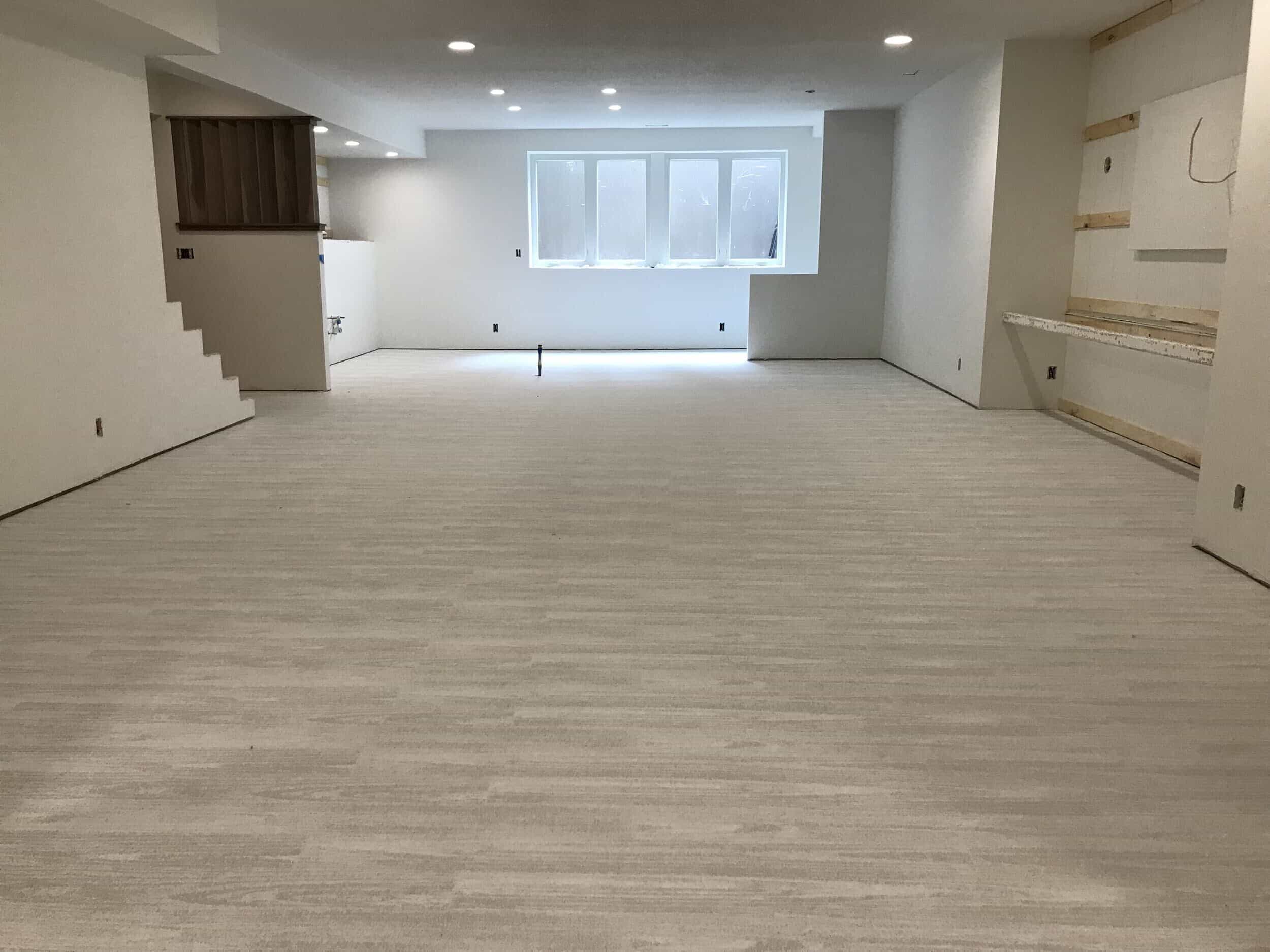 floors after being laid looking bright and smooth there is subtle variation in the shades of grey veining 