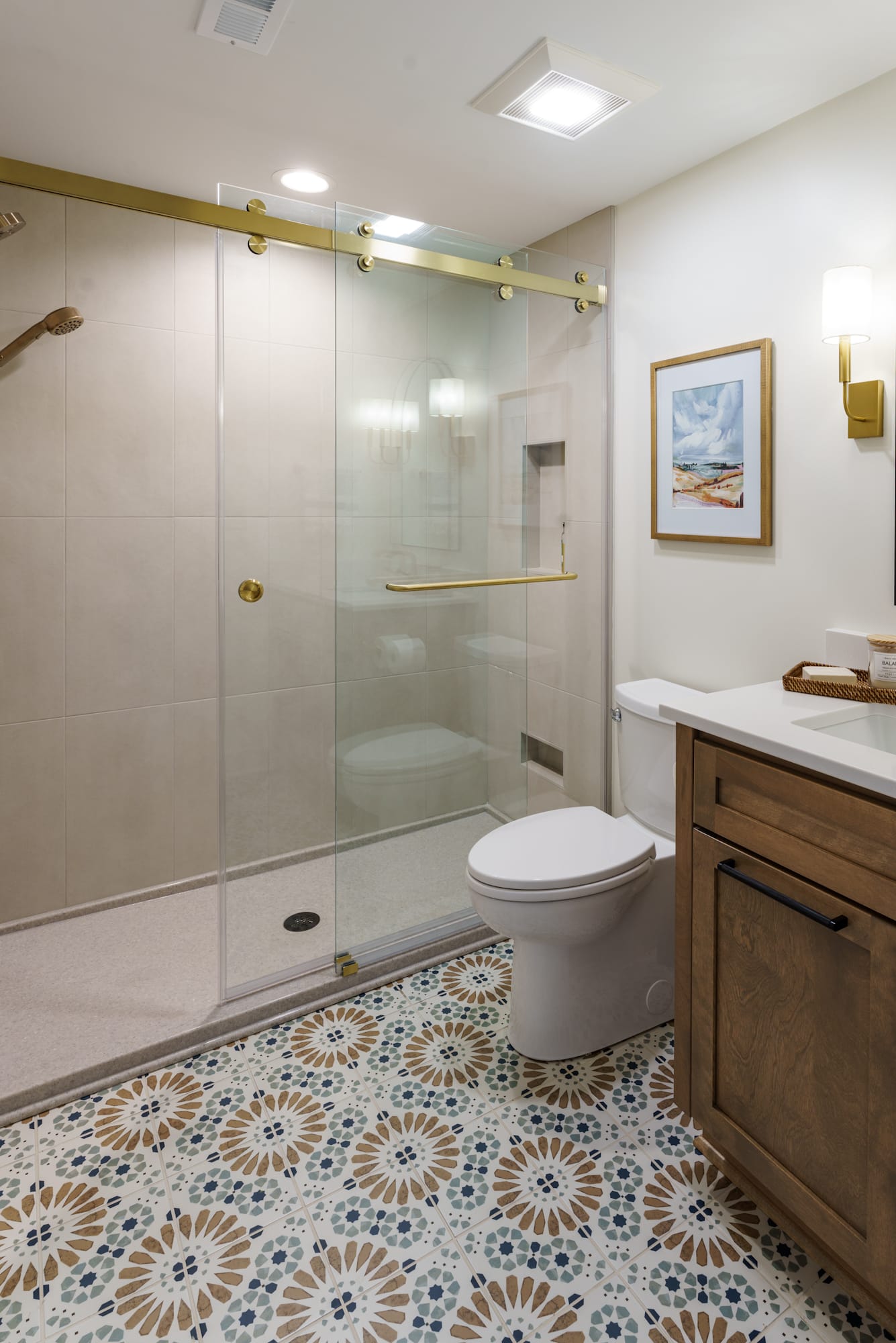 gold fixtures on sliding glass shower door