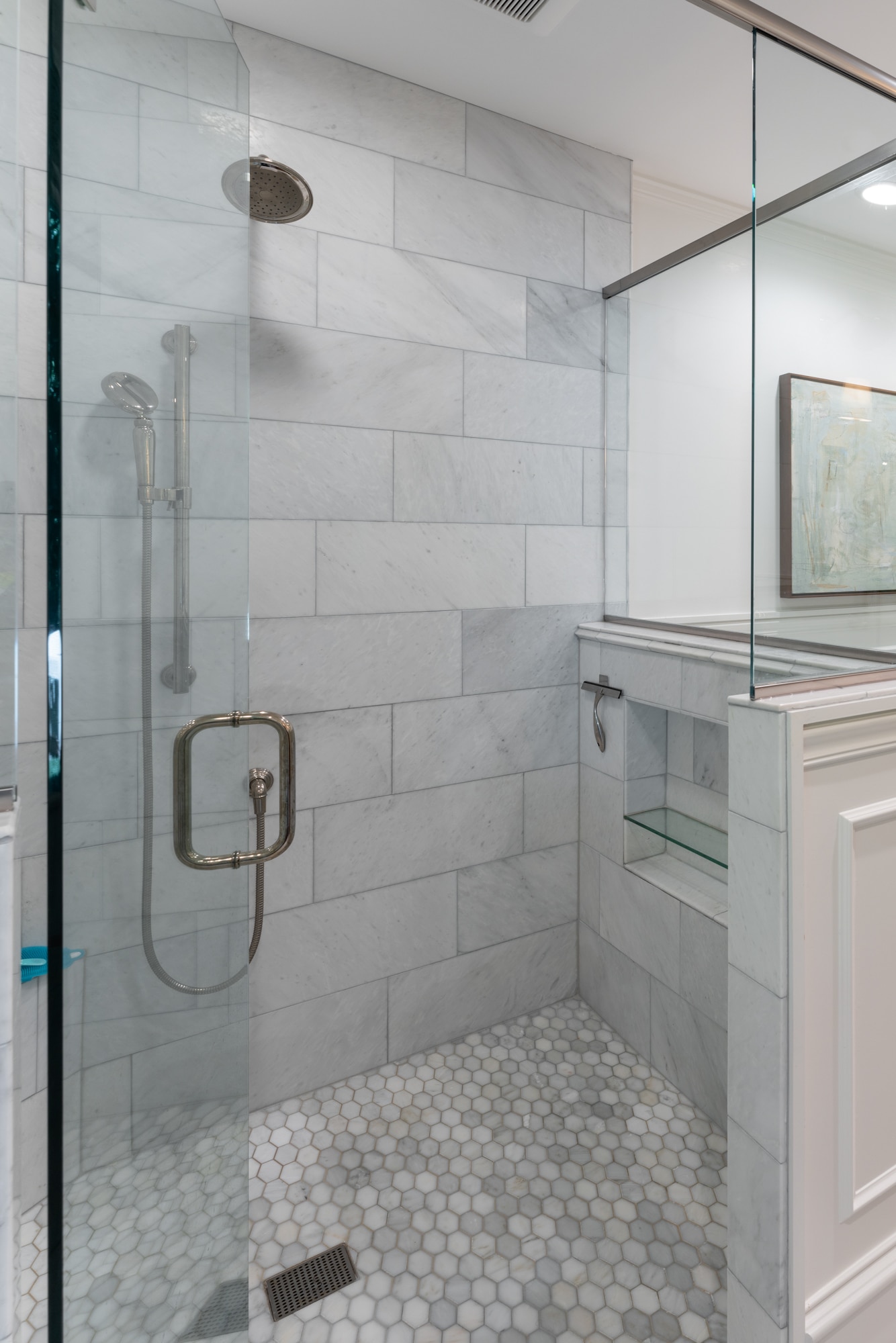 large walk in shower with pivot door