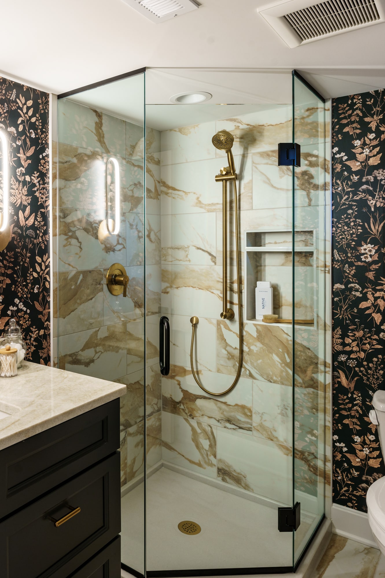 neo angle corner shower door in basement bathroom 