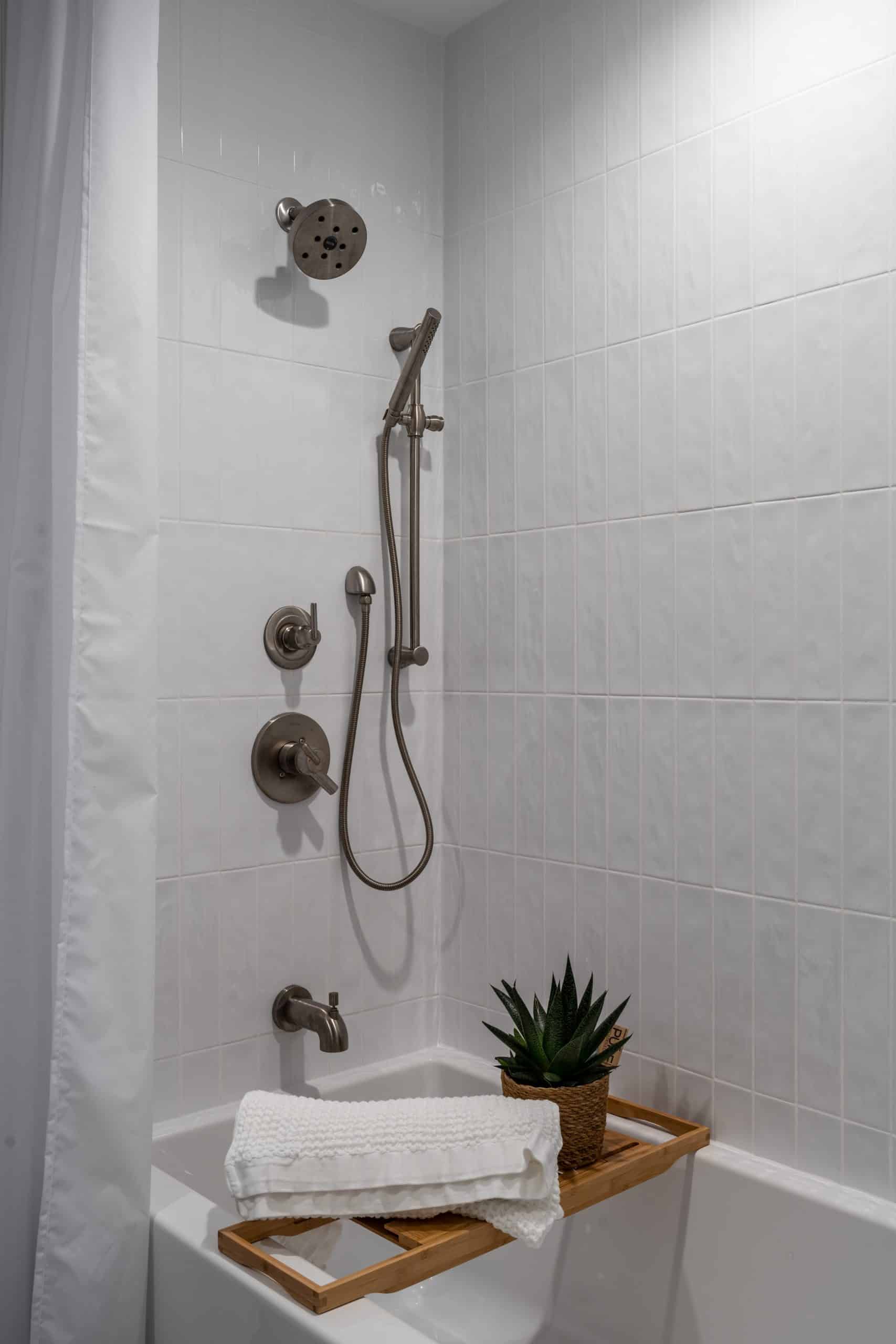 shower curtain on white tub shower combo