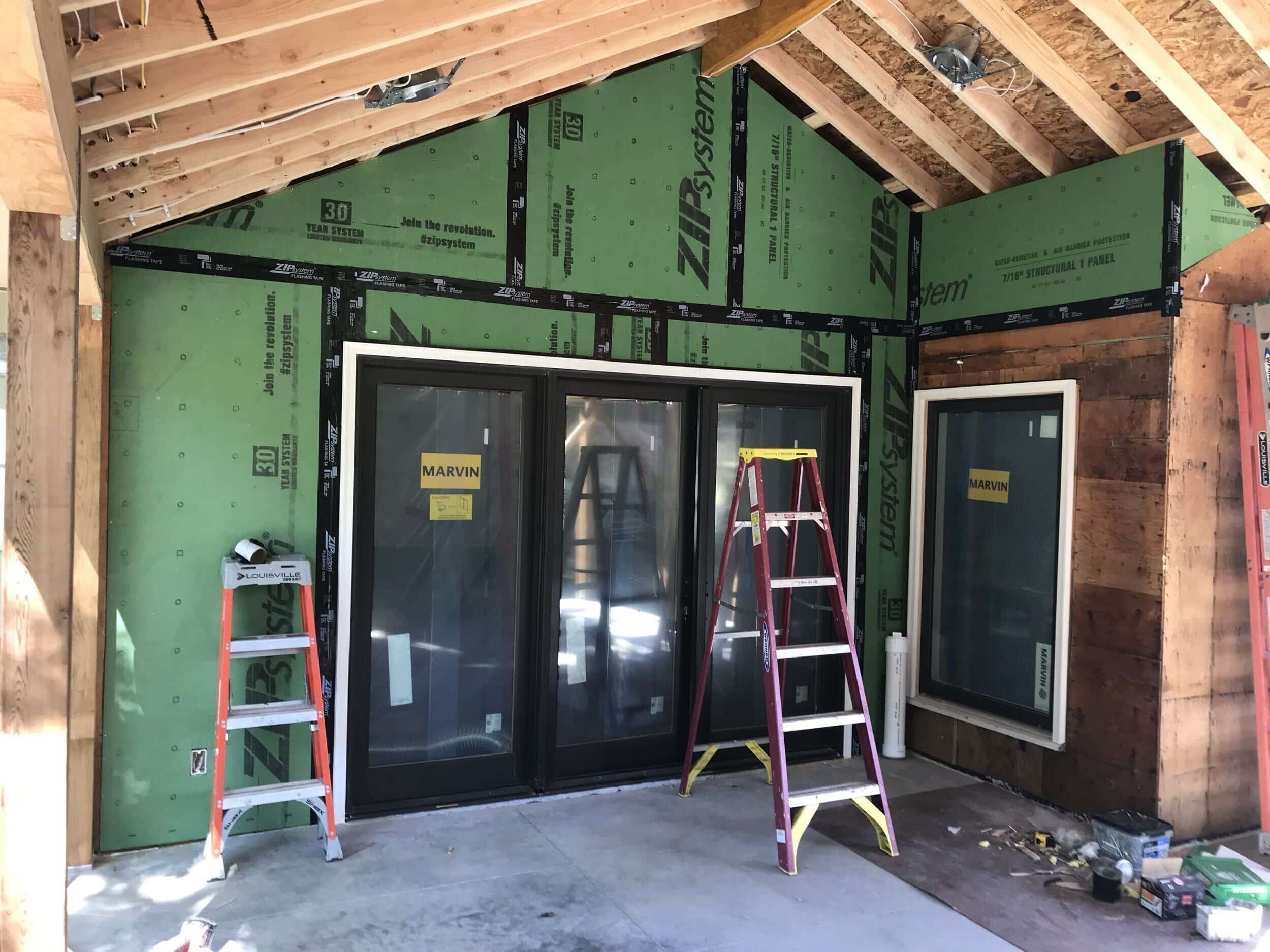 drywall and siding up to prep for new walls