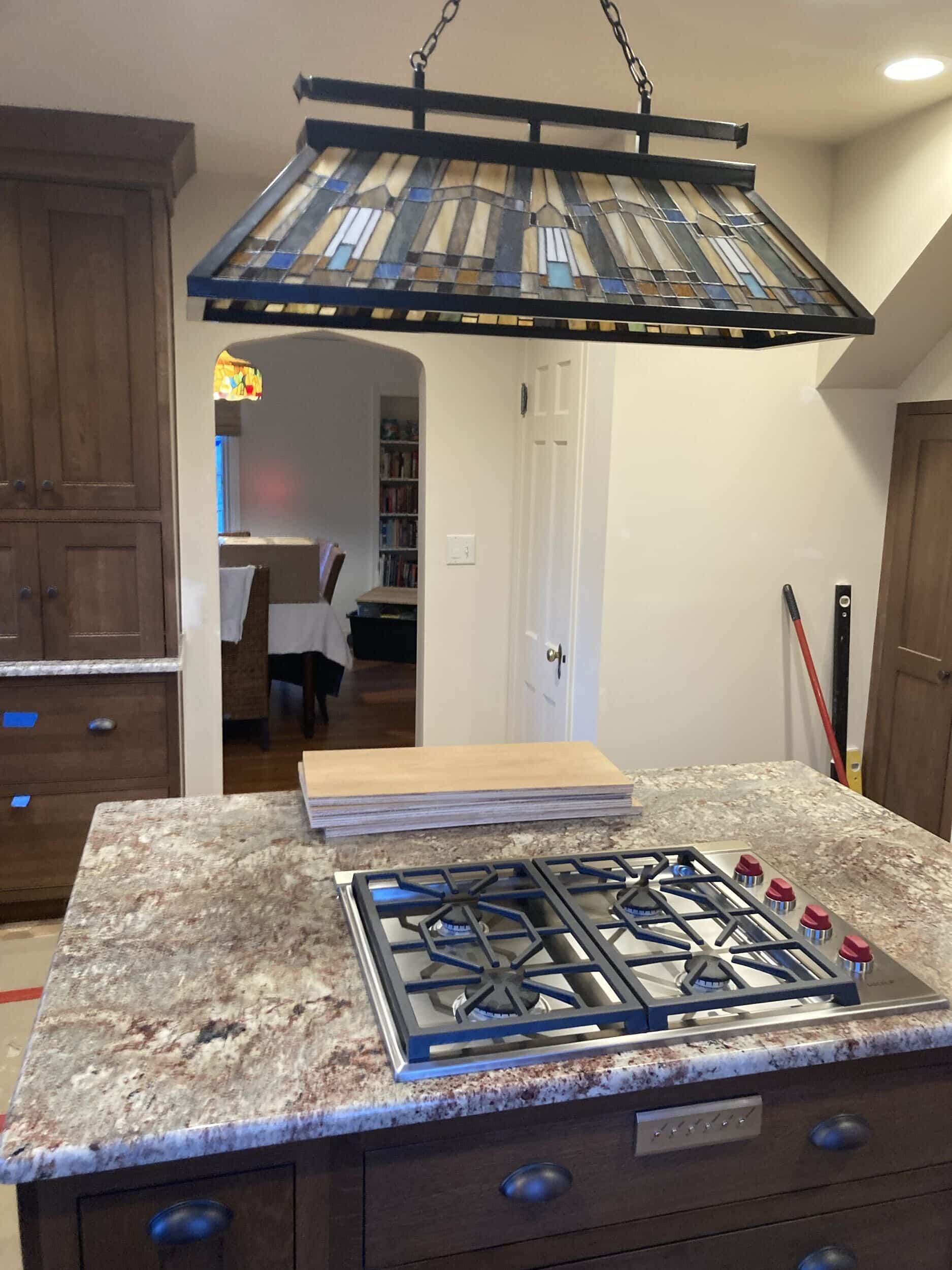 range installed and lighting above island