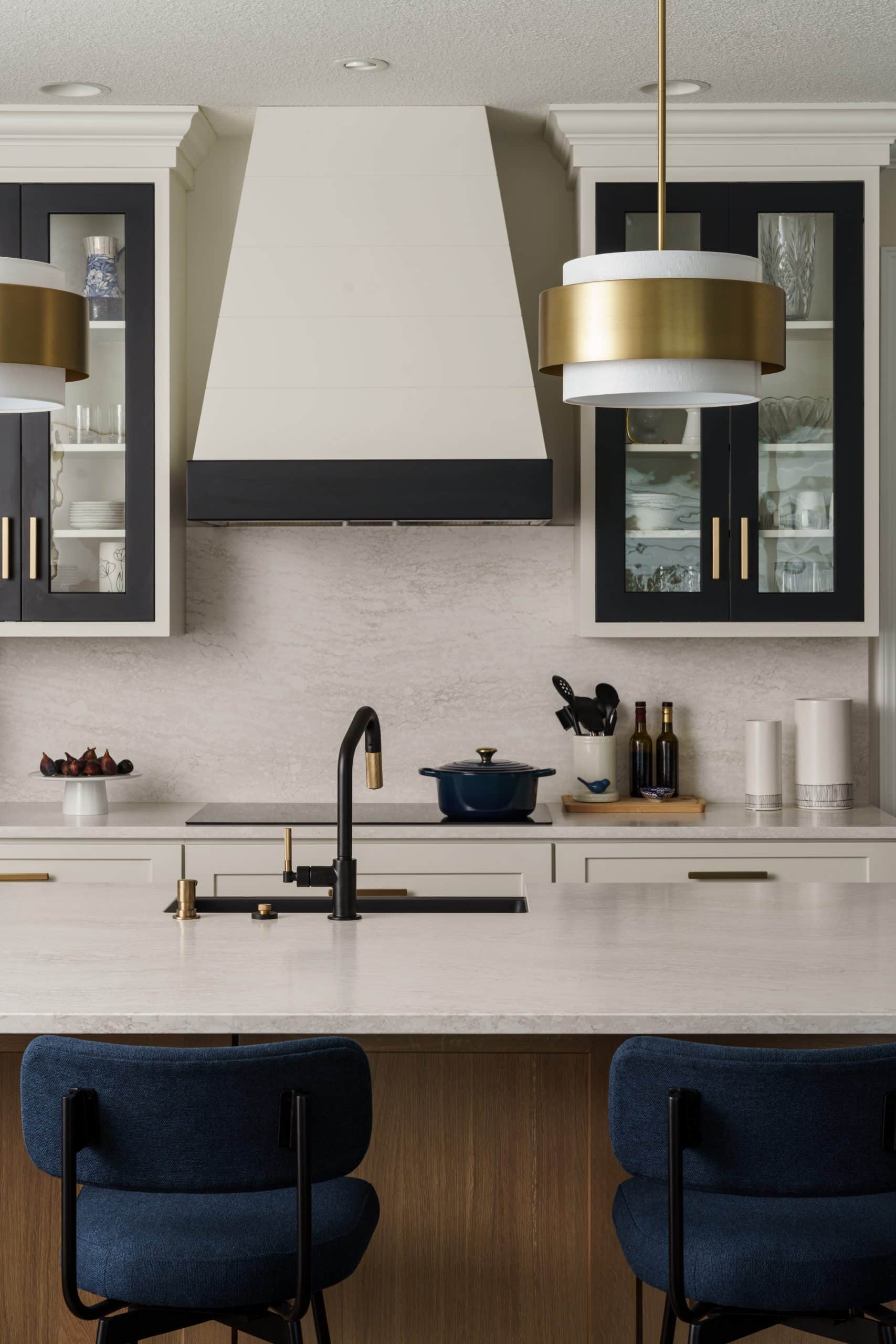 drama glam range hood kitchen remodel detail shot in leawood main floor remodel