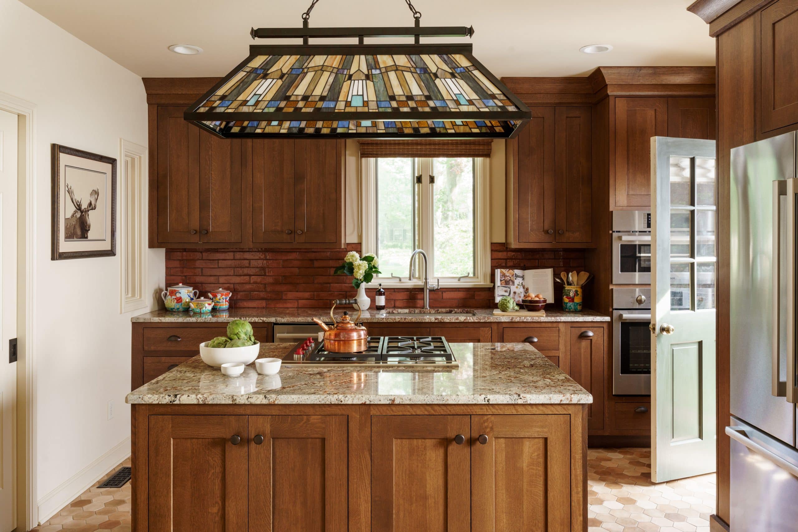 Charming armour hills kitchen remodel in kcmo with warm wood tones and tones of character