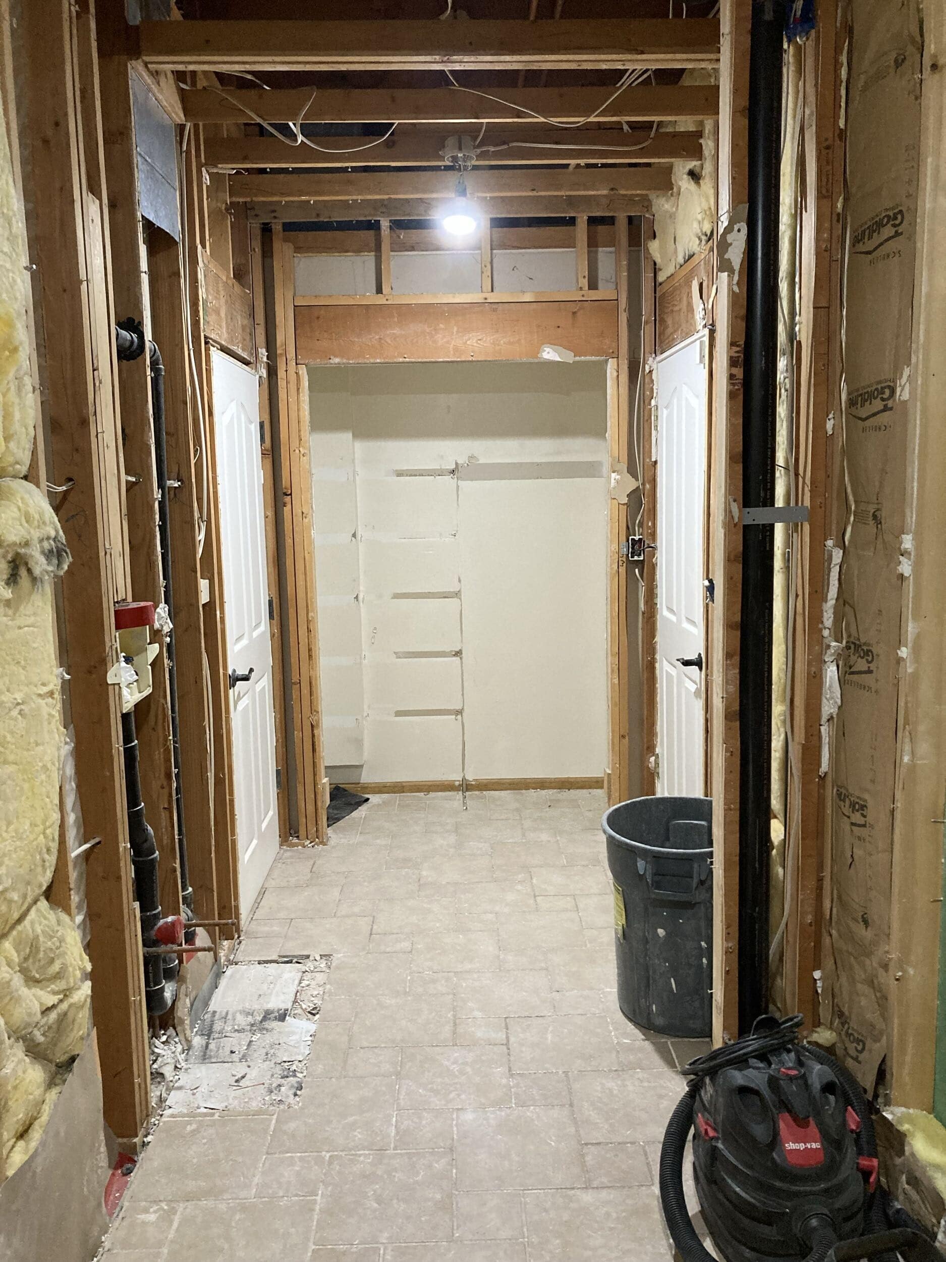 demo of mudroom during handyman remodeling project in lee's summit mo this view shows the door from the garage