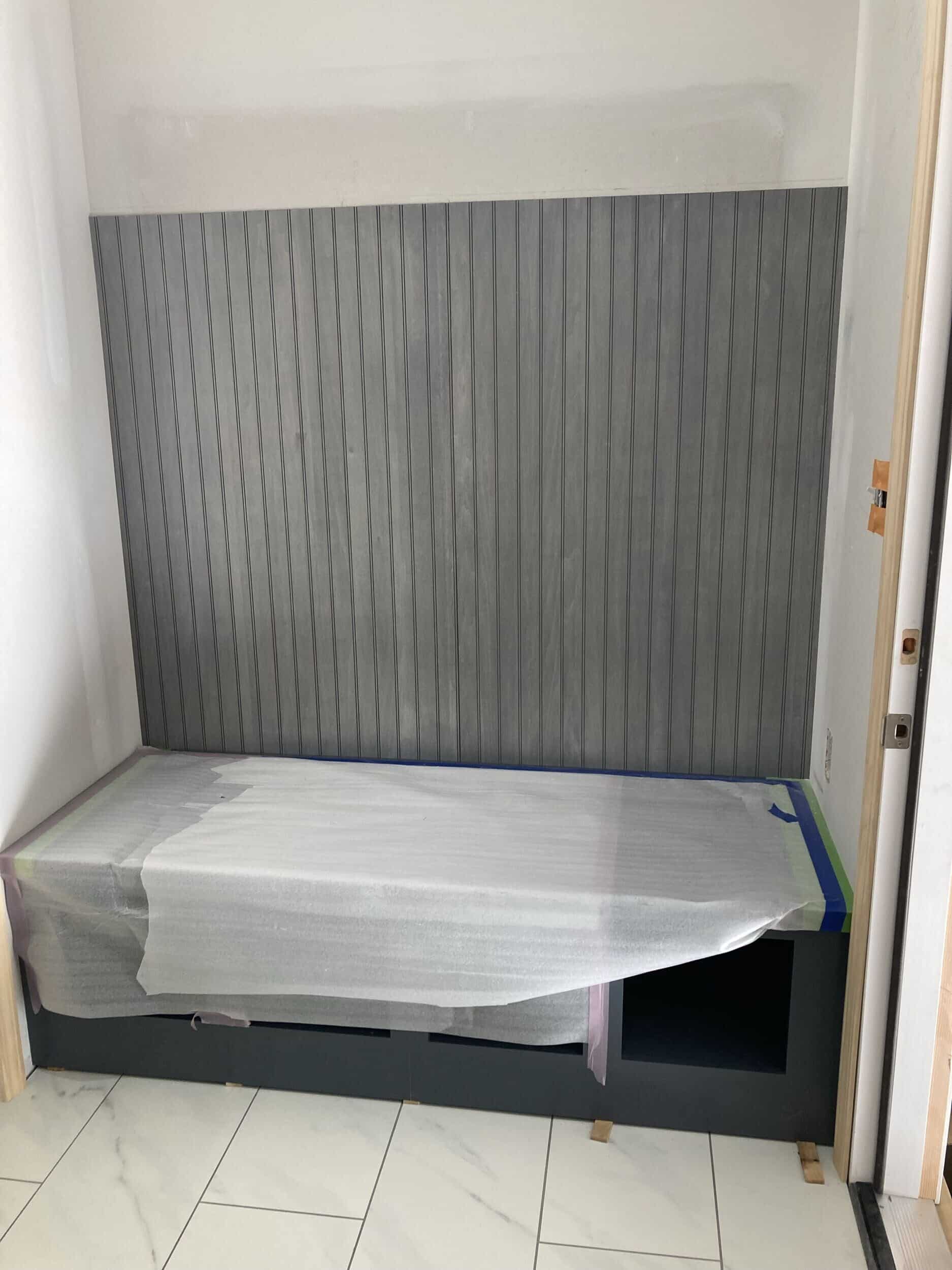 cabinets being installed at our lee's summit handyman services remodeling project for the mudroom and laundyroom remodel