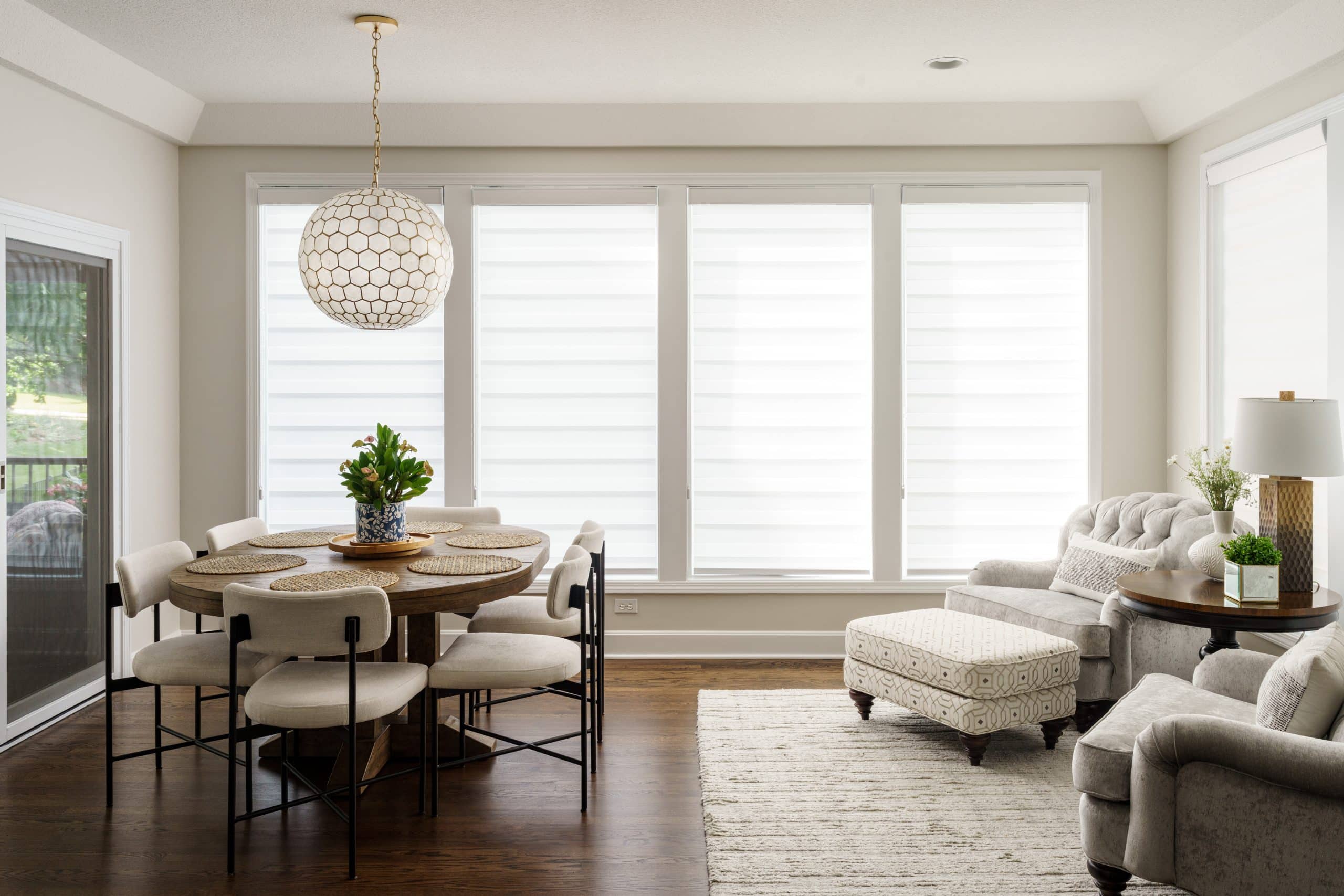 modern dining area in leawood mainfloor remodel with glam classic black and white design