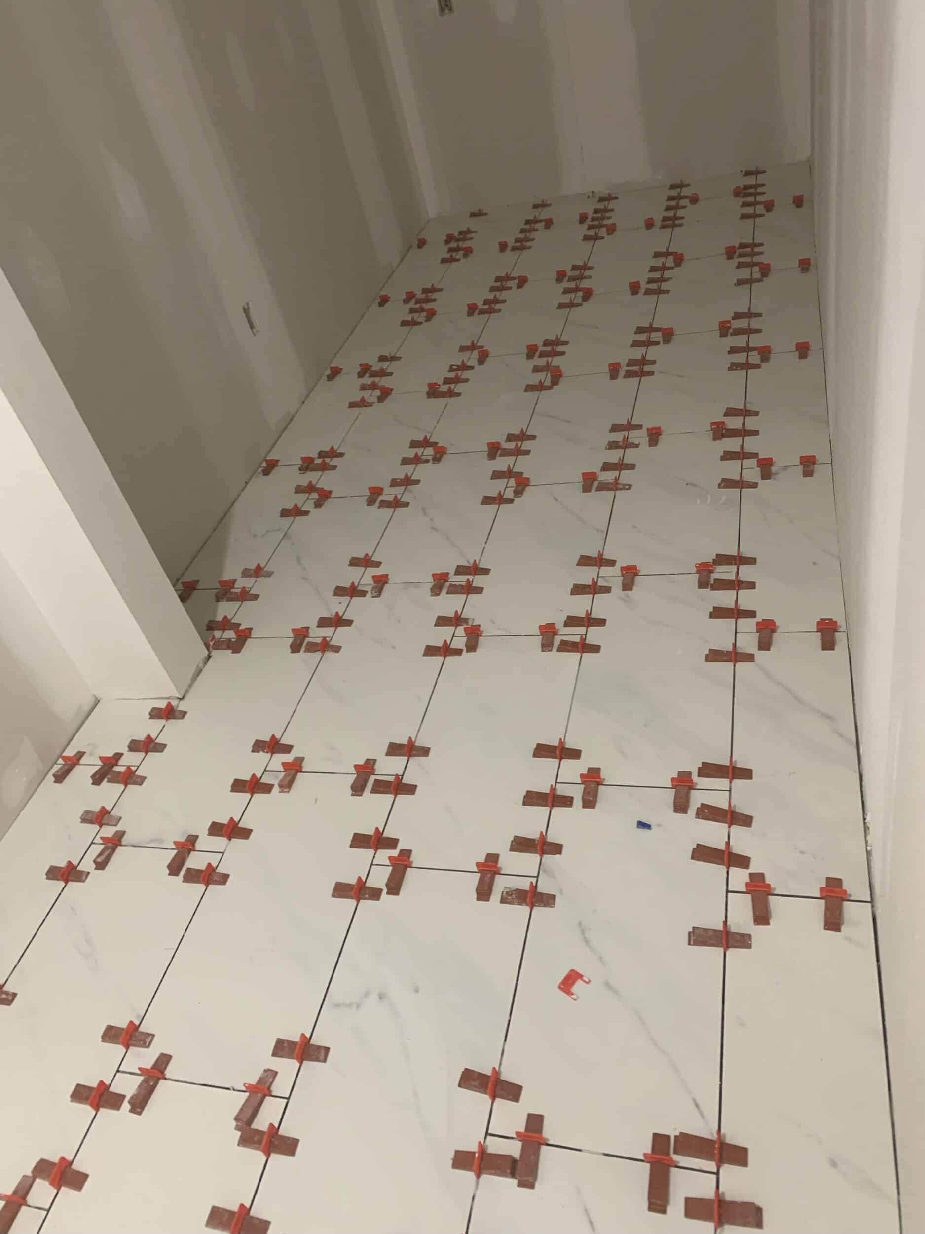 tile laid in handyman remodeling project in lee's summit mudroom project