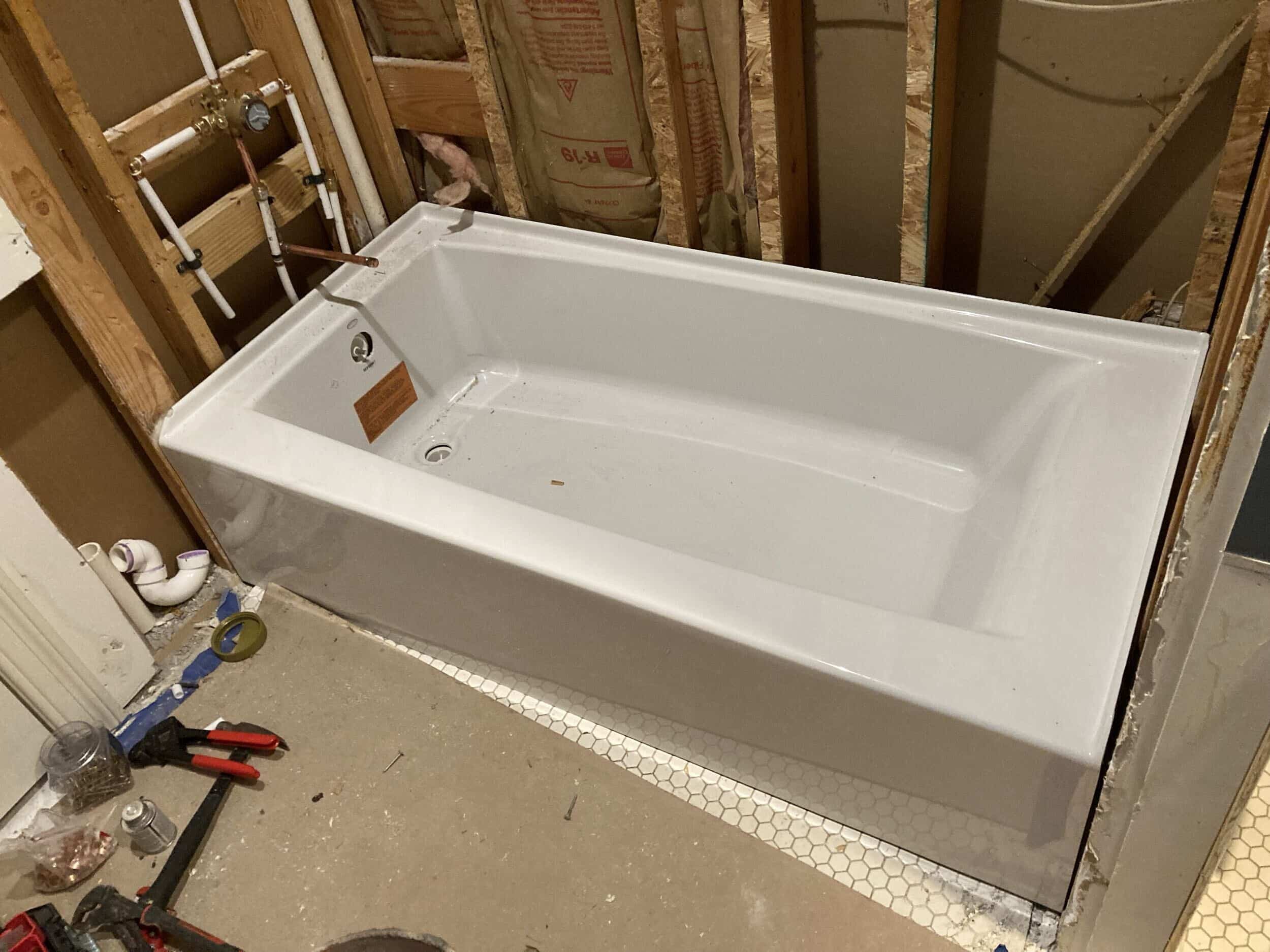 new tub shower combo installed in handyman remodeling project