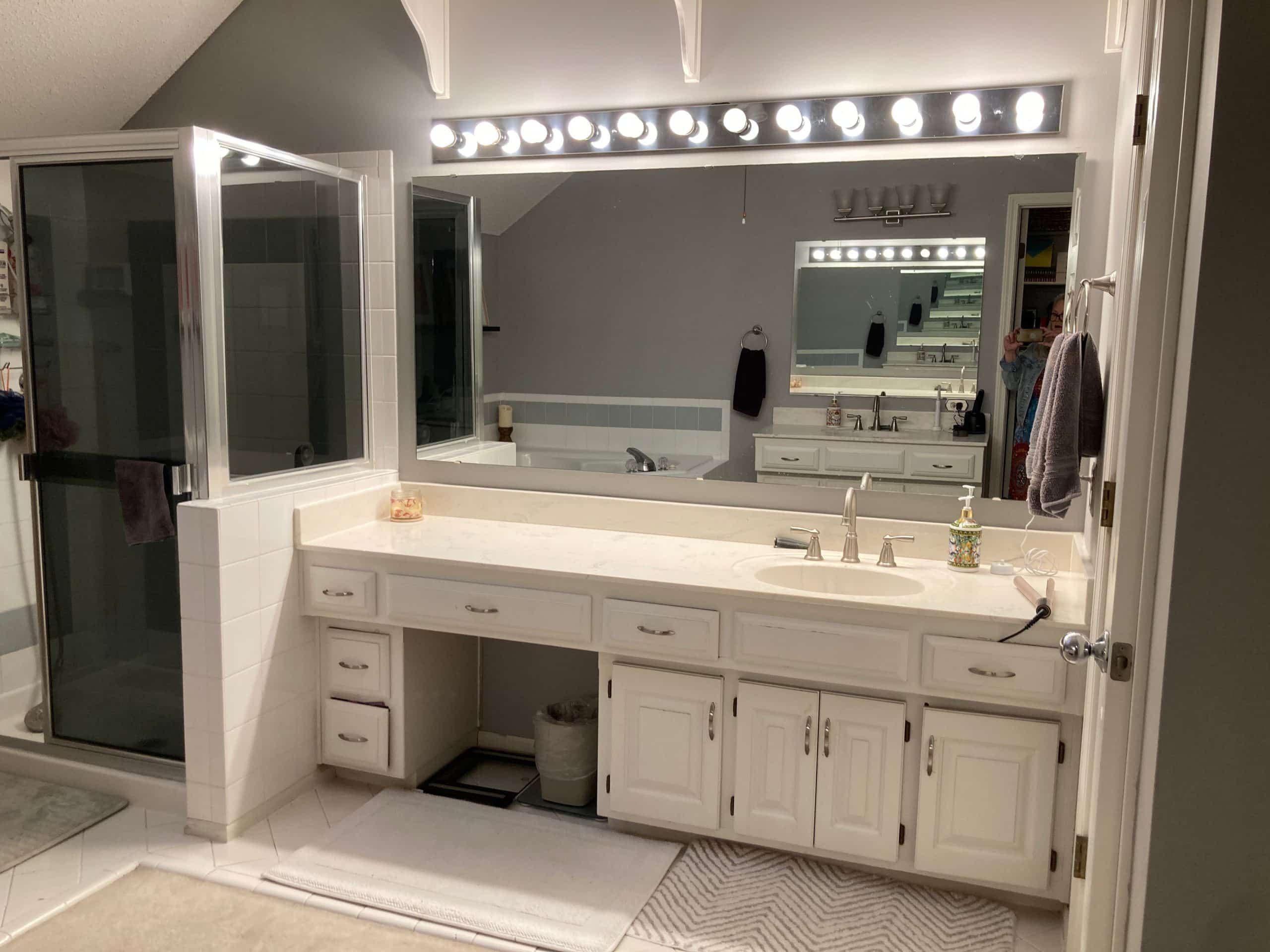 before the bathroom remodel showing existing cabinetry that works but needs a facelift or new coat of paint