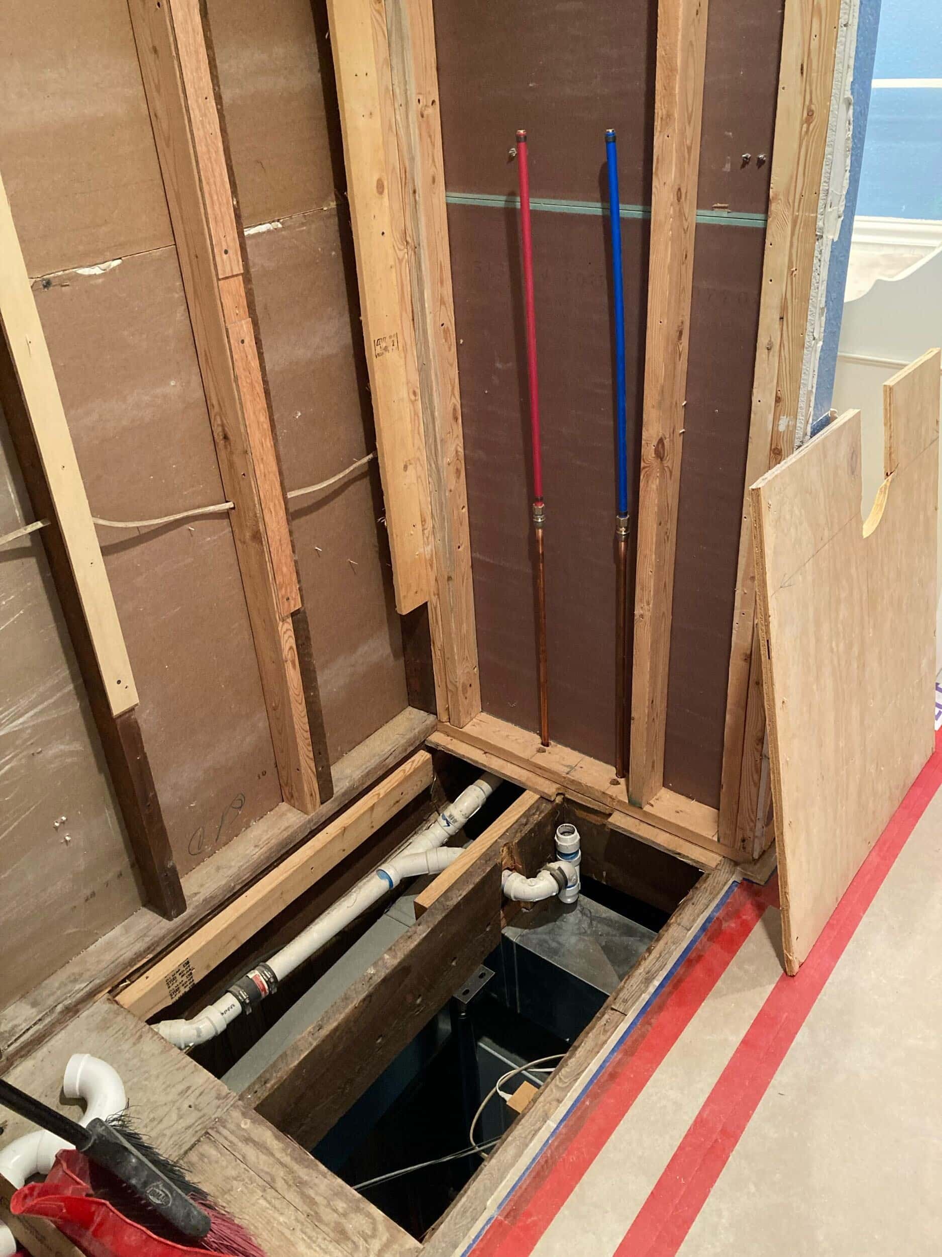 shower pan demo in remodel at lake of the ozarks by handyman team